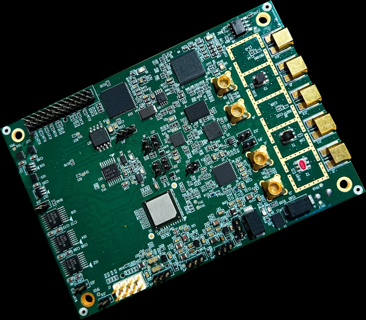 A green data acquisition board with a row of gold RF connectors along one edge