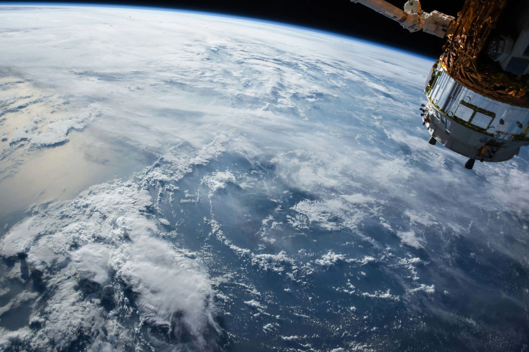 A small satellite in orbit above the Earth